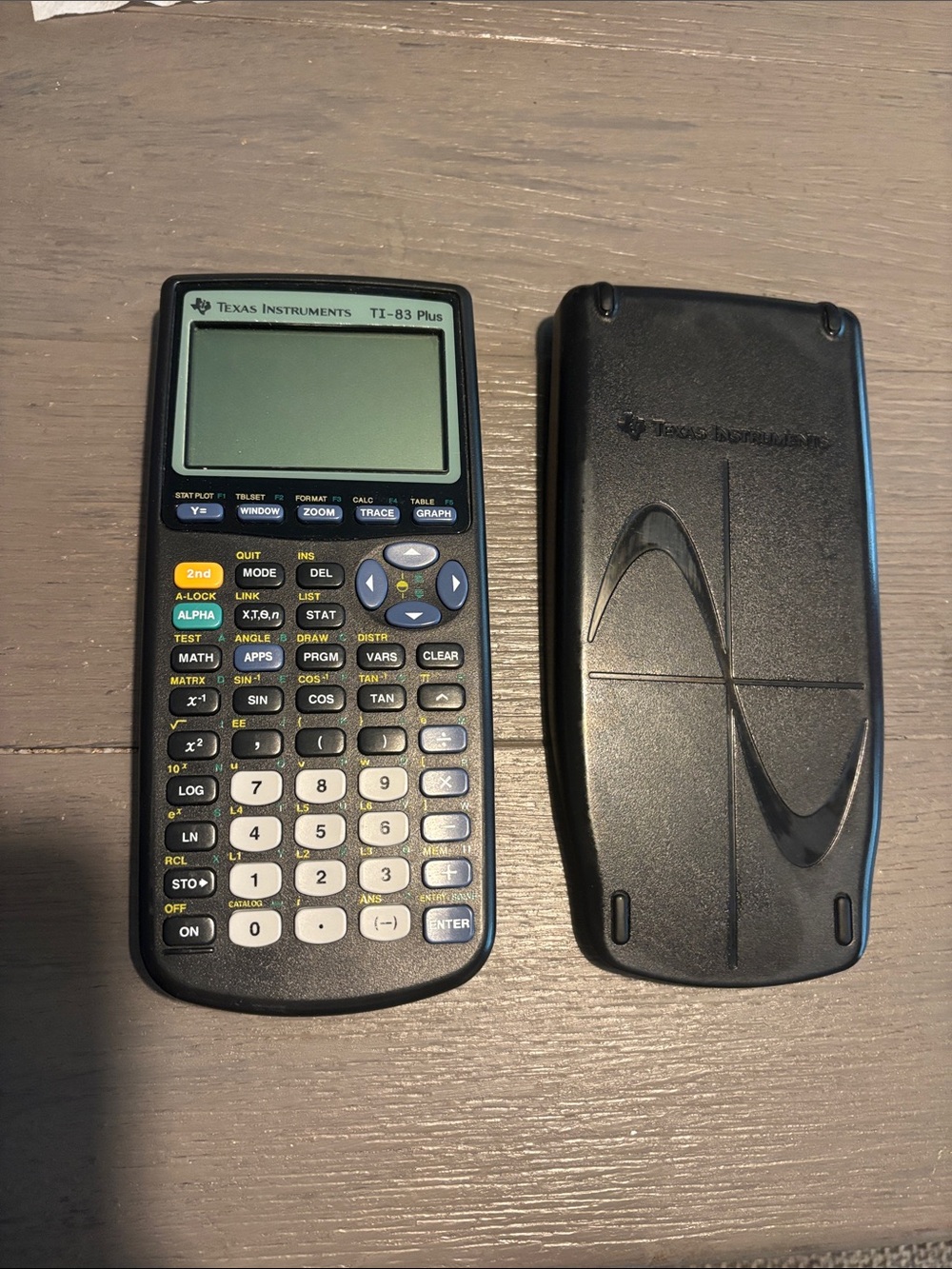 Texas Instruments TI-83 Plus Graphing Calculator - Black with Yellow/Blue Keys